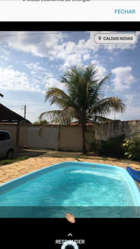 Ótima Casa Caldas Novas 2 km do centro para ate 14 pesssoas com piscina aquecida, churrrasqueira, Wifi
